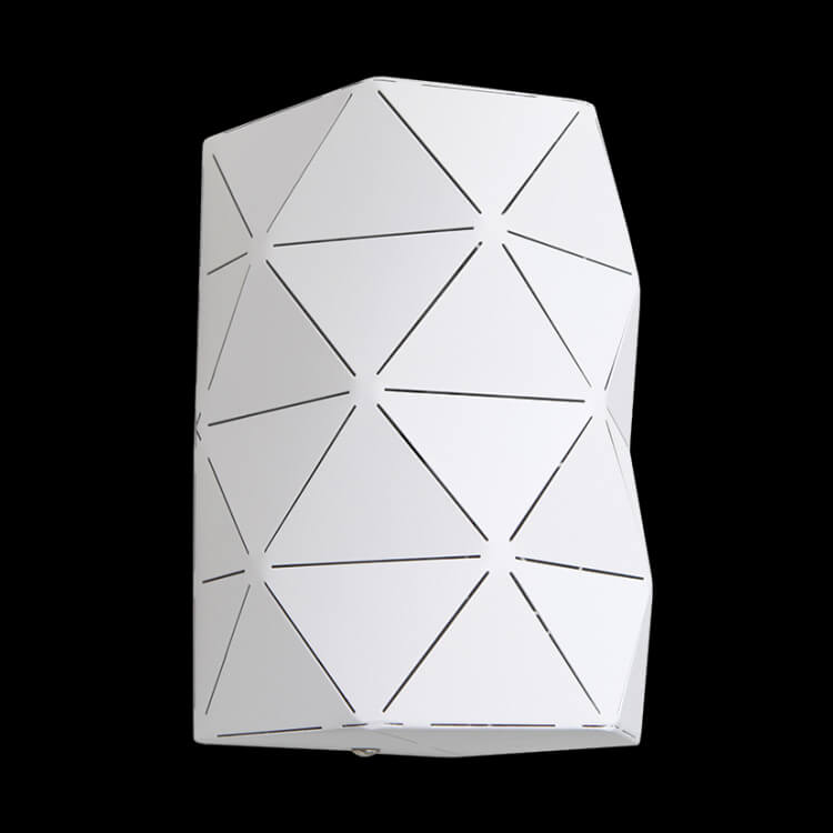 Laser-cut metal cylinder wall light.