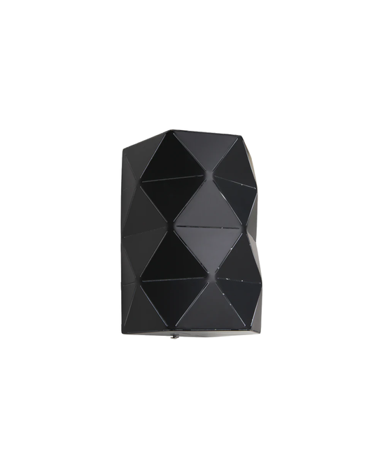 Laser-cut metal cylinder wall light.