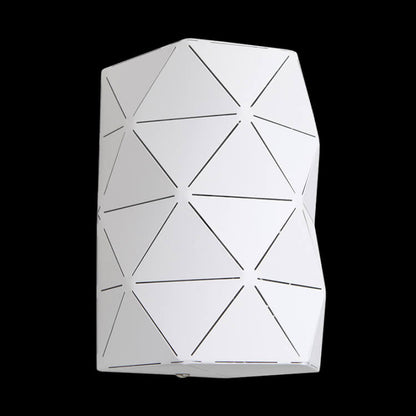 Laser-cut metal cylinder wall light.