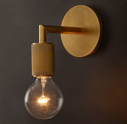 Gold metal wall light.